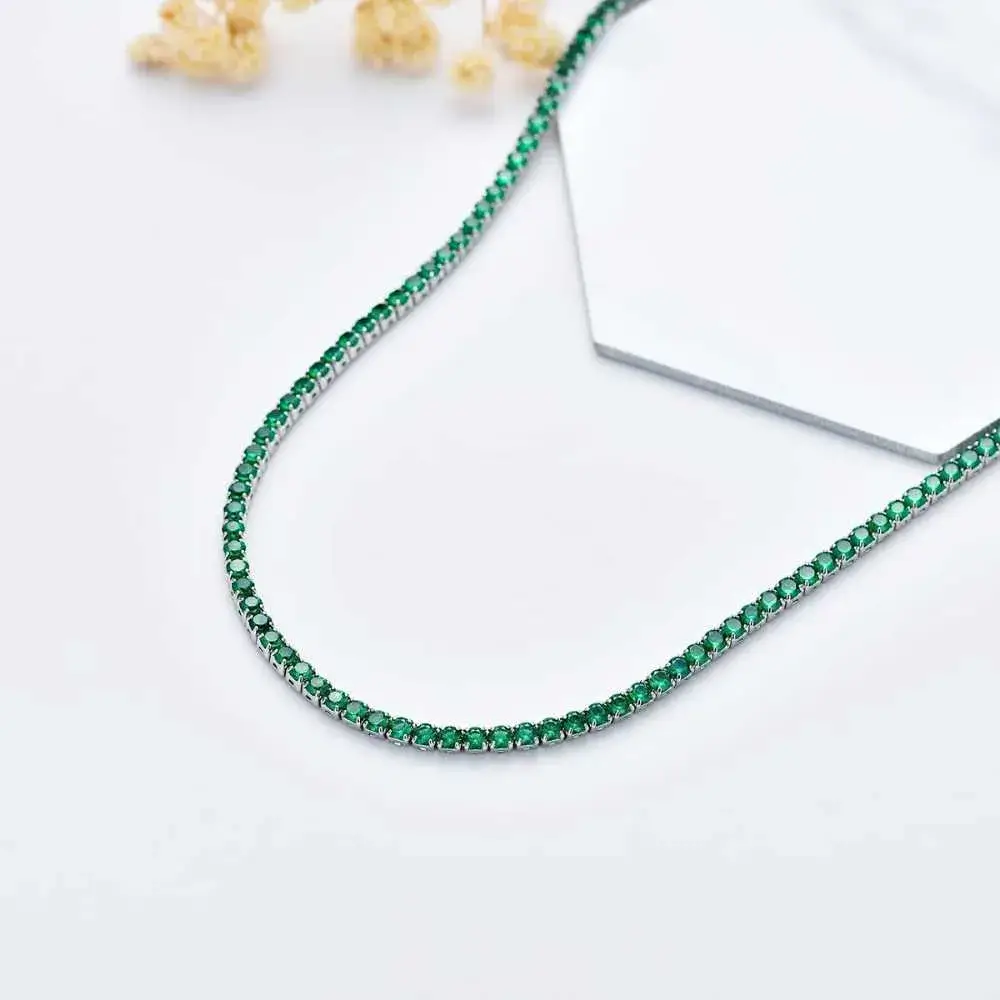  emerald tennis necklace on a white background
