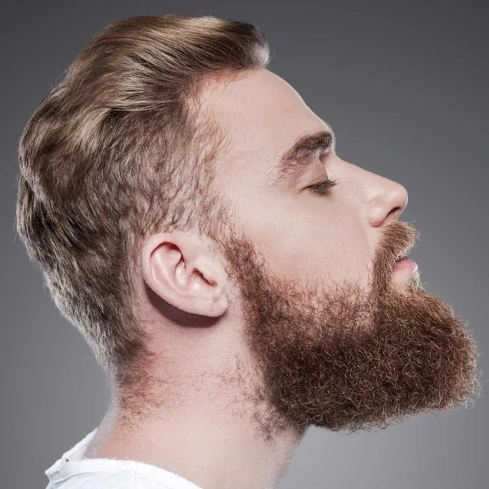 side view of a young man with beard