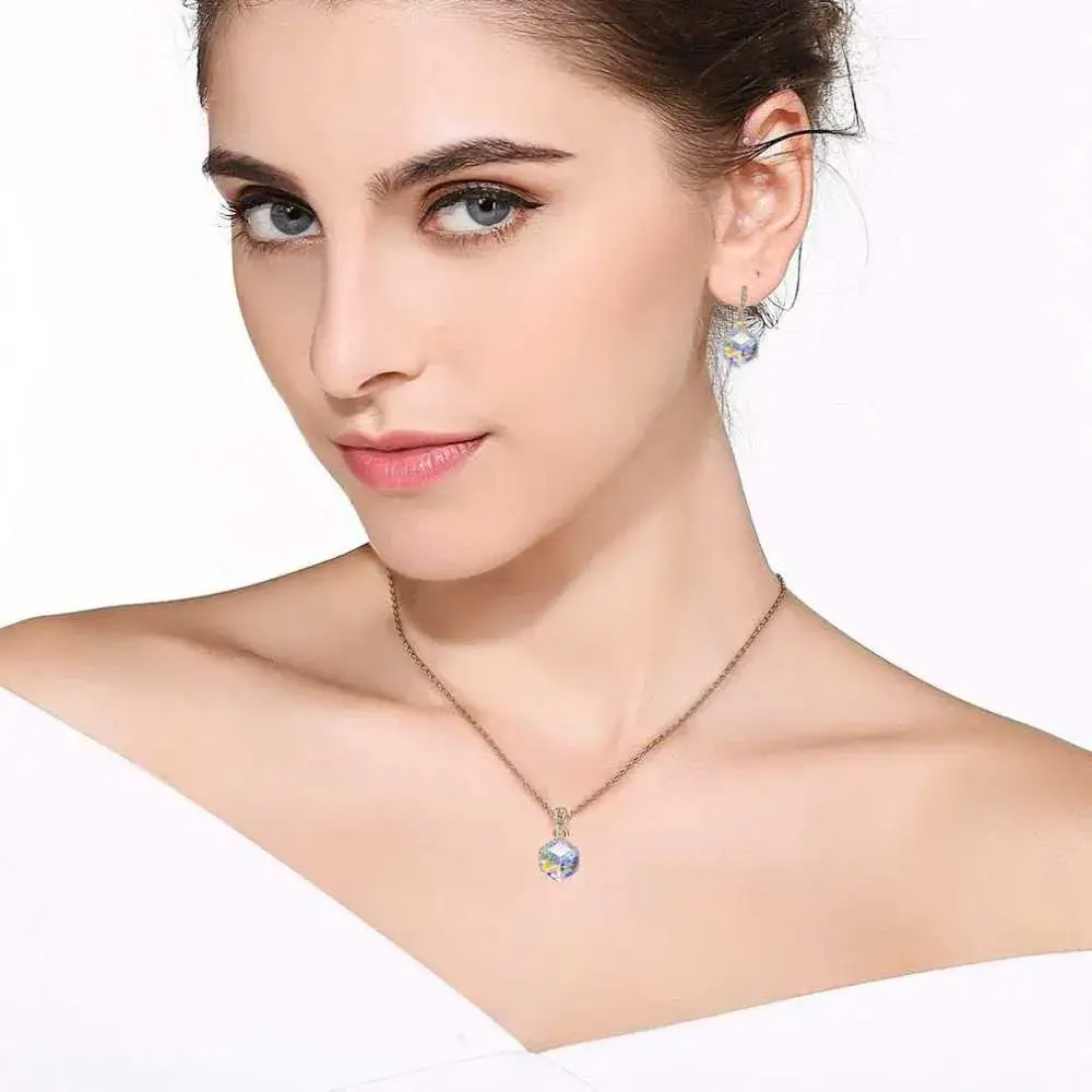 beautiful brunette wearing color-changing necklace and earrings