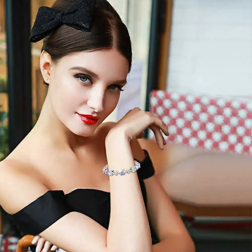portrait of a beautiful model wearing northern lights crystals bracelet