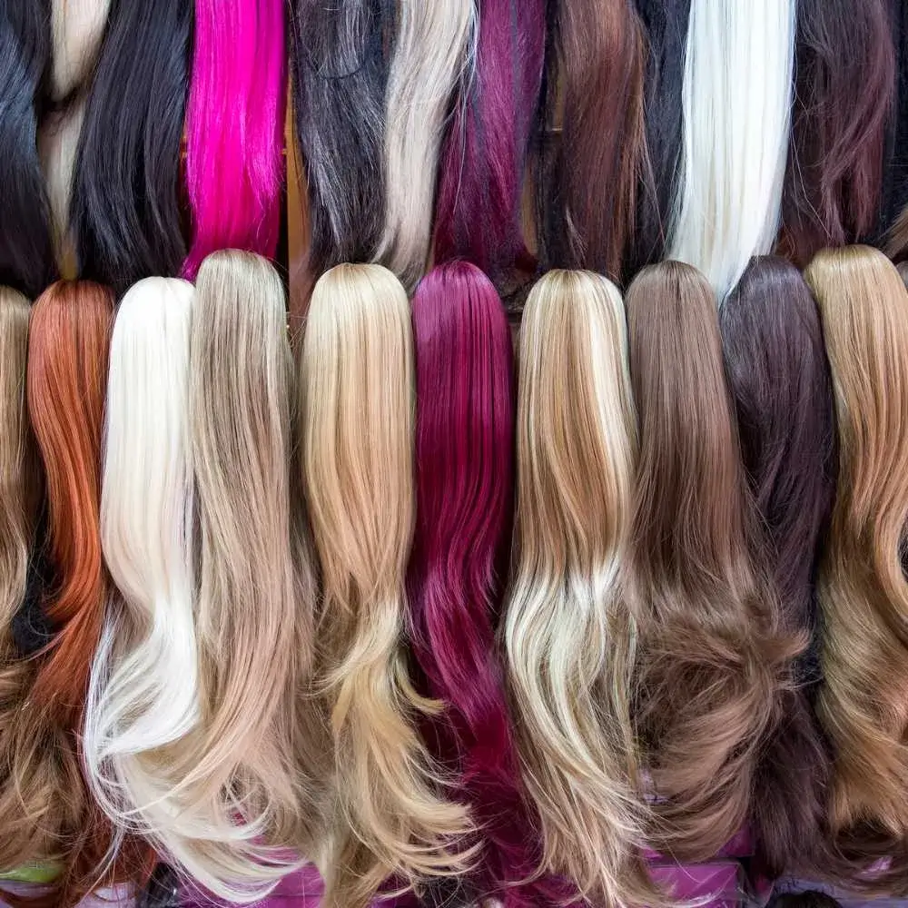 different colors of human hair wig on the shelf