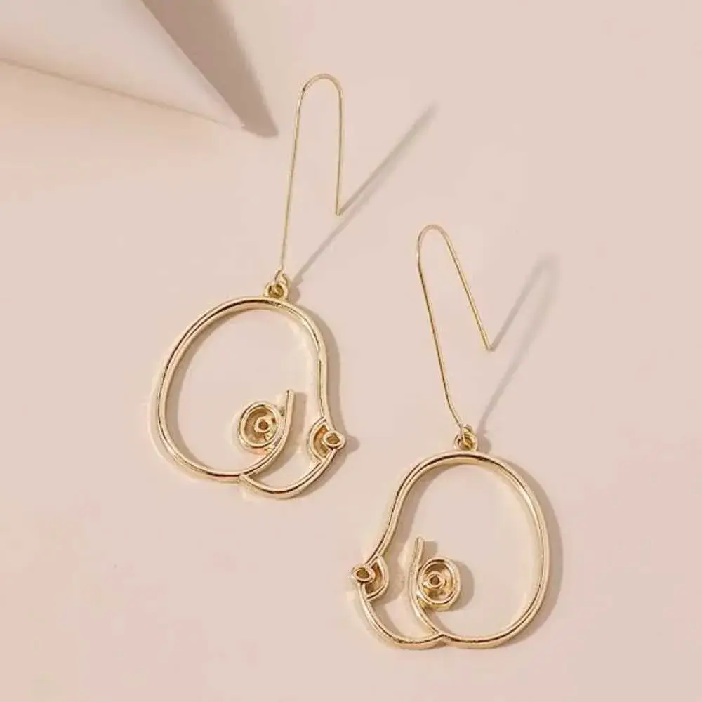 golden geometric boob earrings