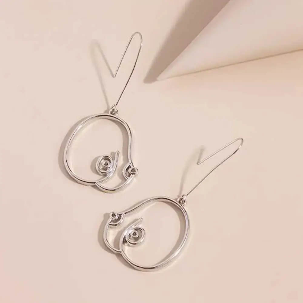 silver geometric boob earrings