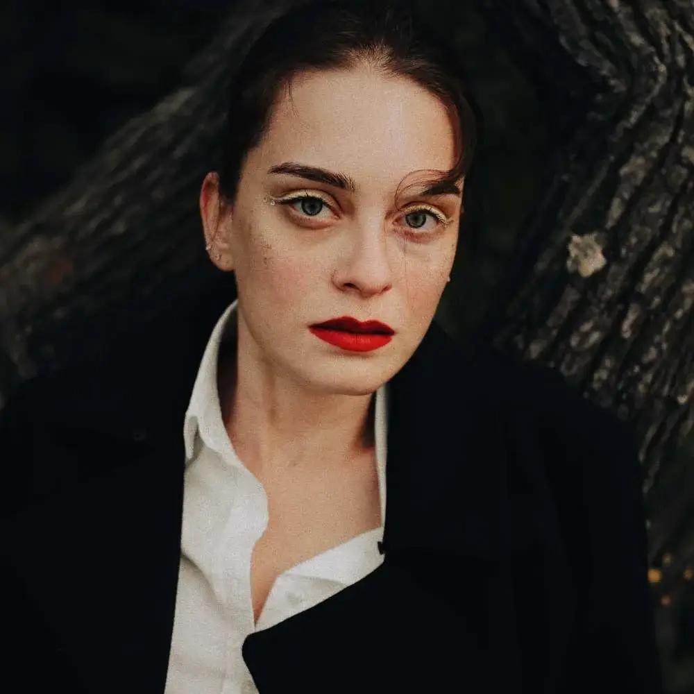 Woman expressing her style with a vibrant, red lipstick