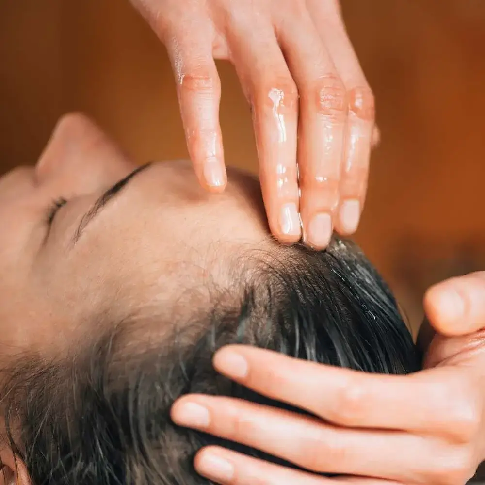 Jojoba oil restores scalp moisture