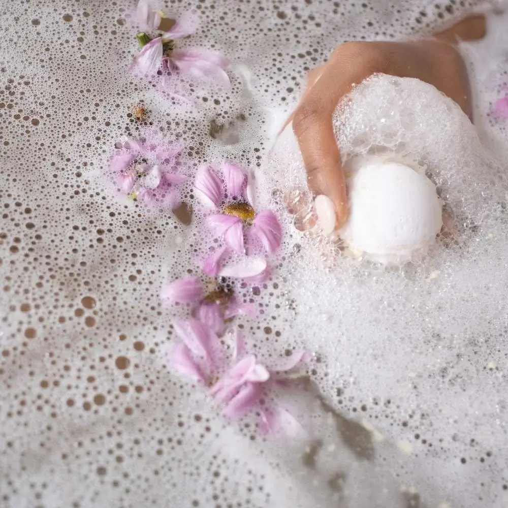 Close-up of a lavender body wash bottle offering a calming bath experience