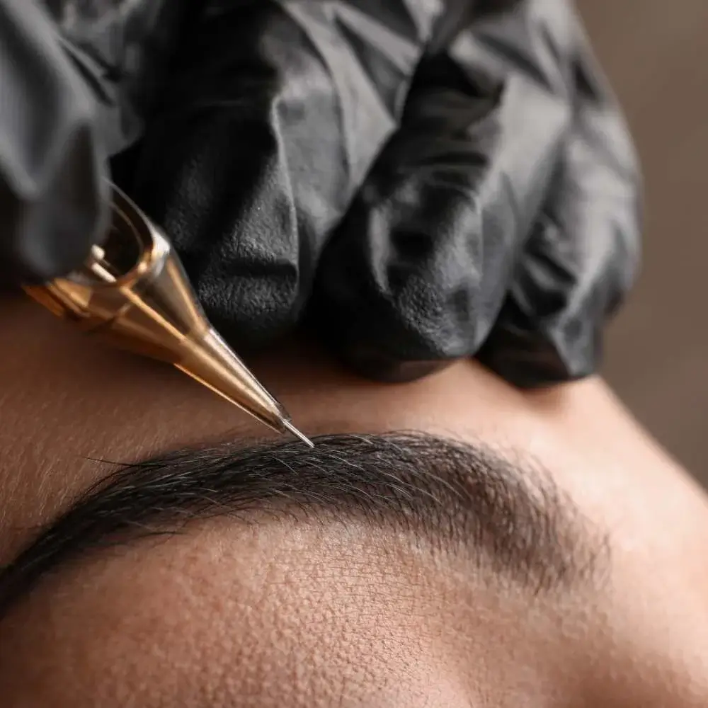 Demonstration of how to use a microblade eyebrow pen for fuller brows