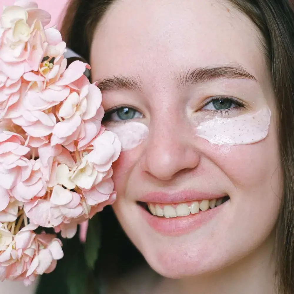 pregnant woman applying safe and effective eye cream