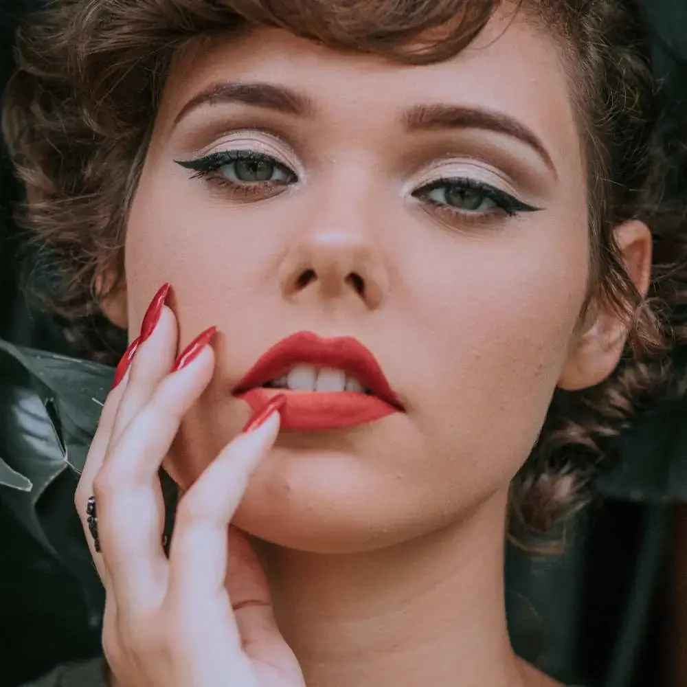Close-up of a beautiful red lipstick application