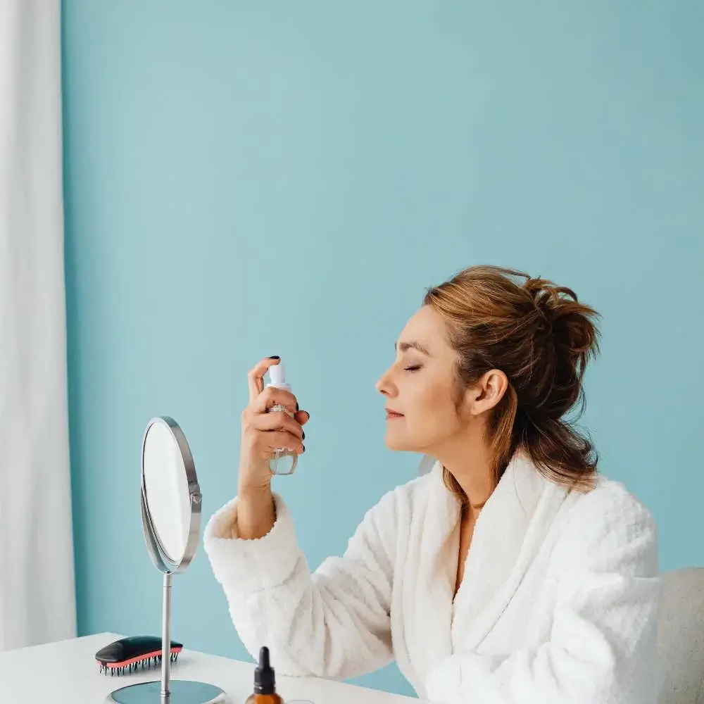 top-rated setting sprays on a makeup table