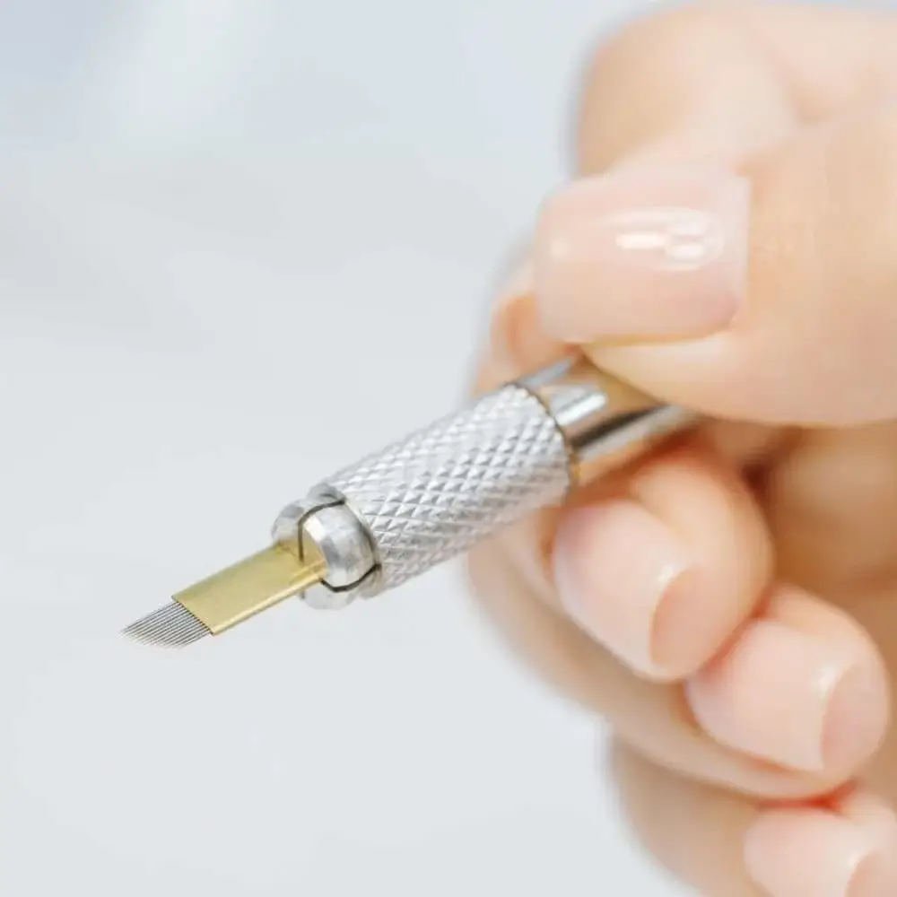 Close-up image of a microblade eyebrow pen for precise application