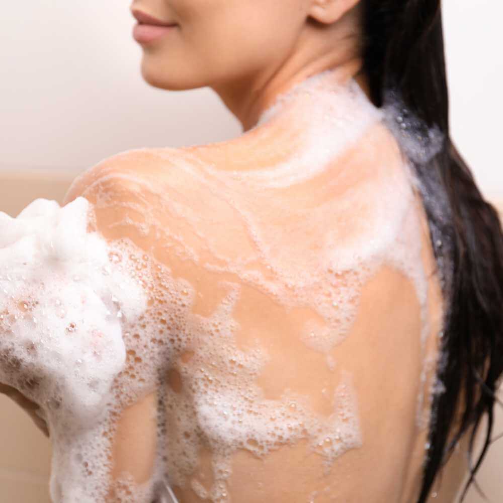 Lathering body wash on sponge