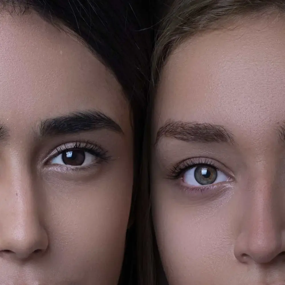 Woman admiring the result of her right eyebrow wax
