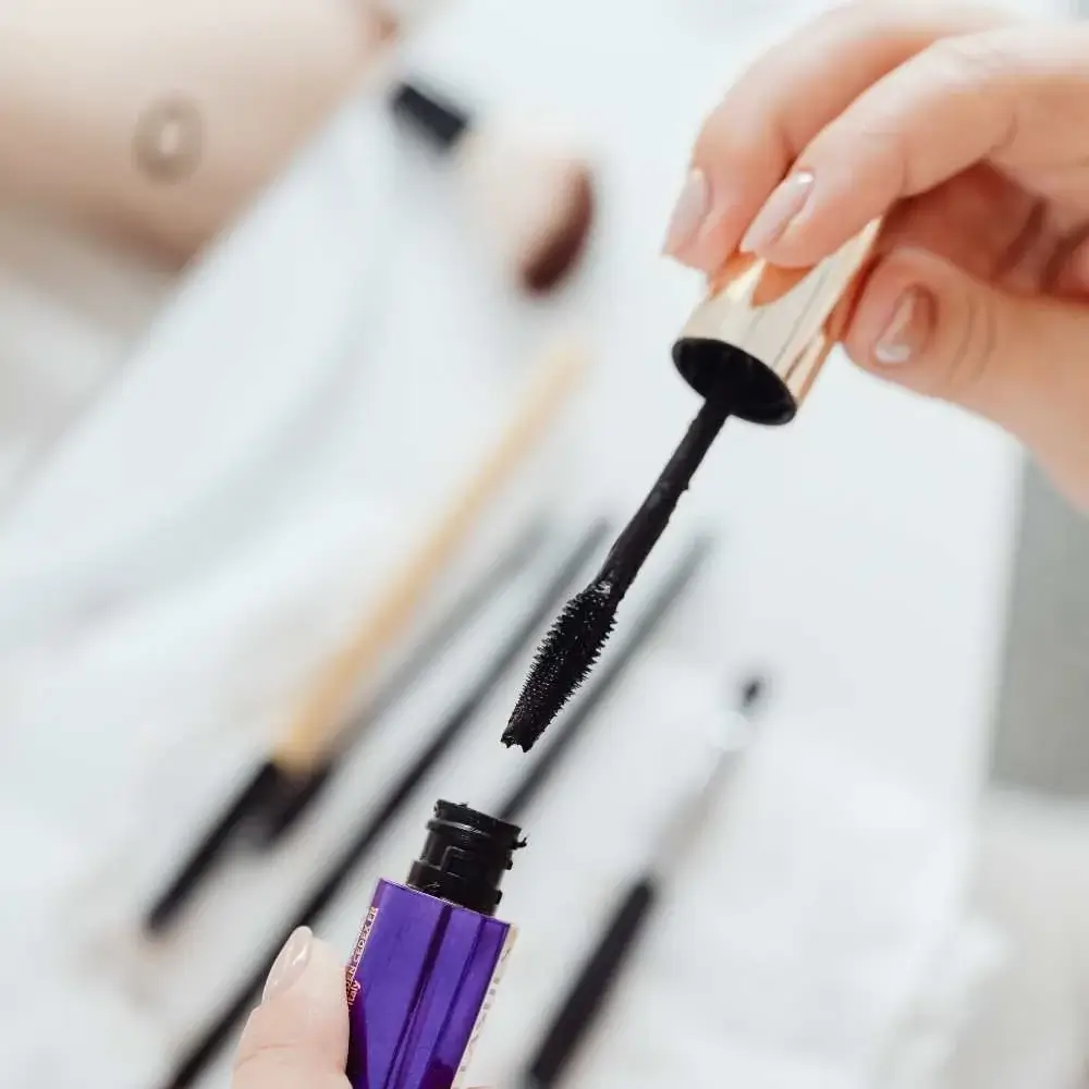 Curling mascara tube and wand