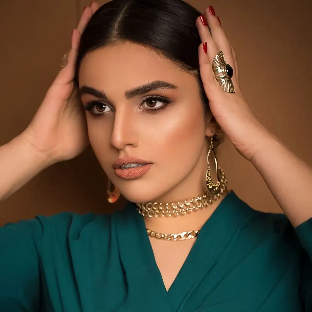 How can I style a cowboy boot necklace for formal events?