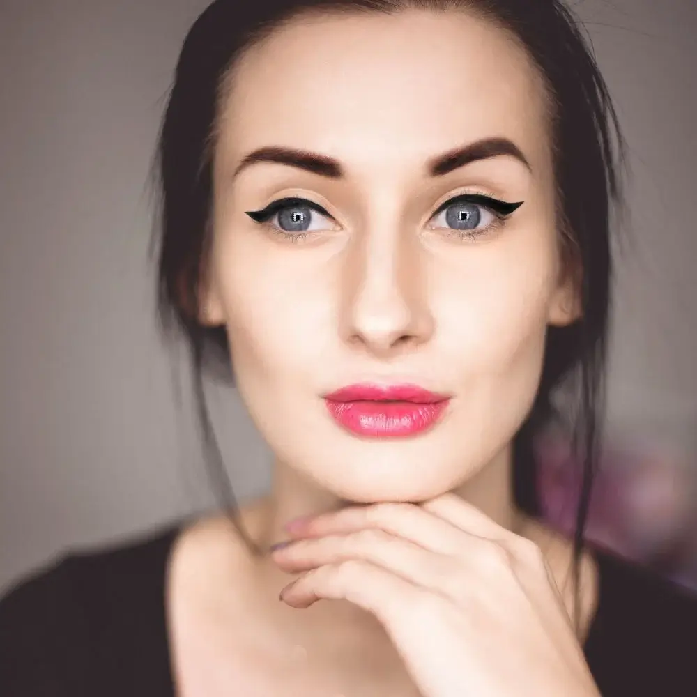 How do you apply eyeliner without damaging eyelash extensions?