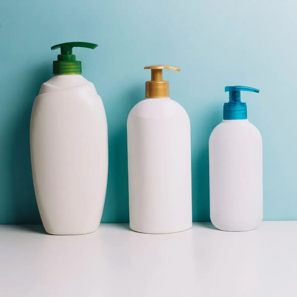 How can I wash my hair 2 weeks after hair transplant?