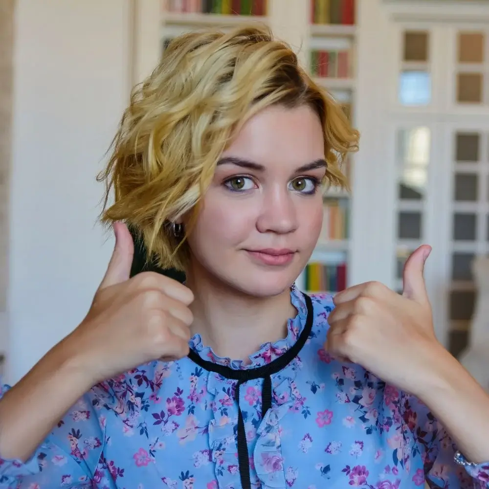 What is the difference between a hot curling brush and a curler?