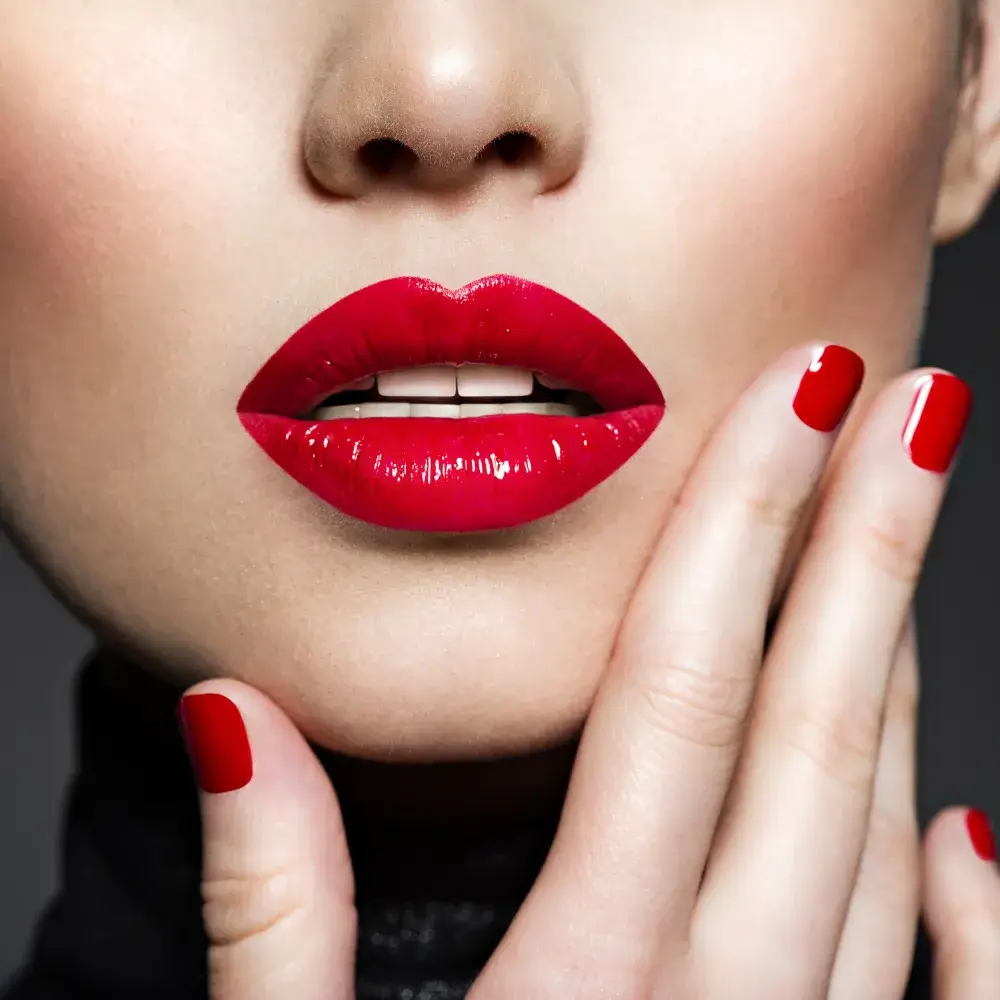 closeup of sexy female lips with red lipstick