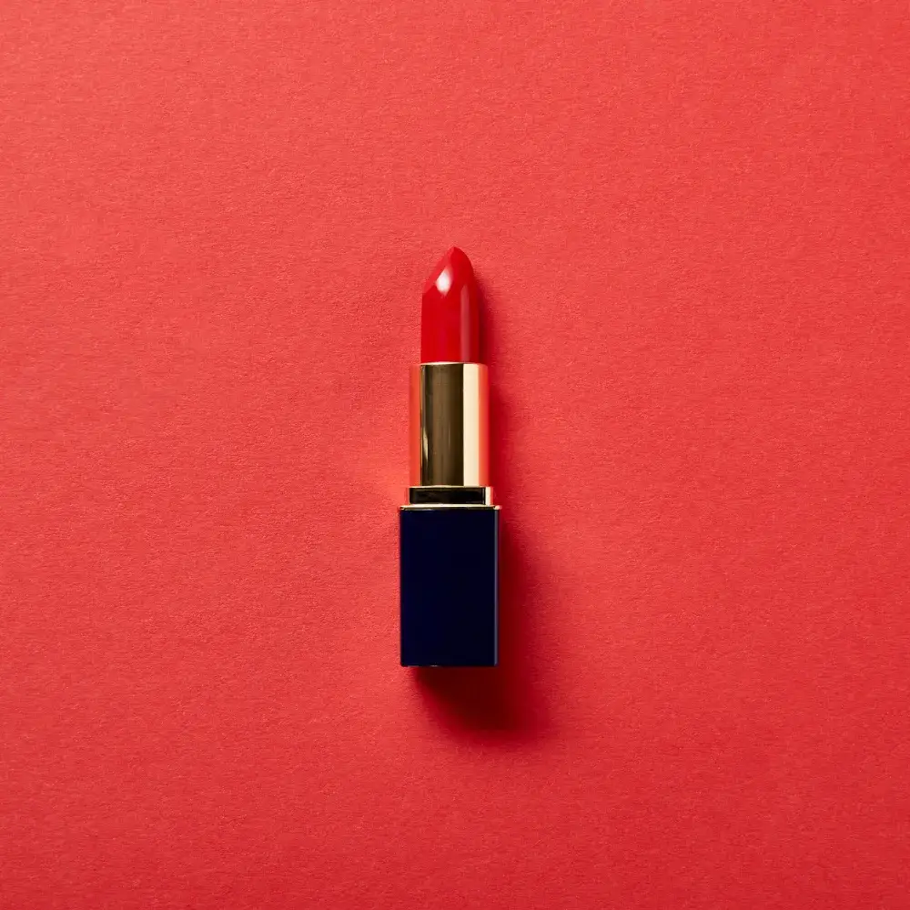 red lipstick on a red background