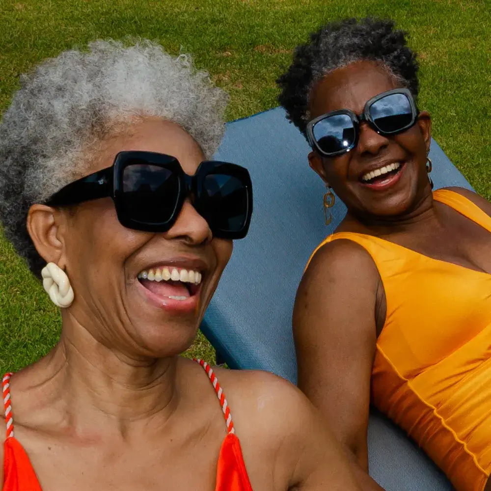 two mature women laughing