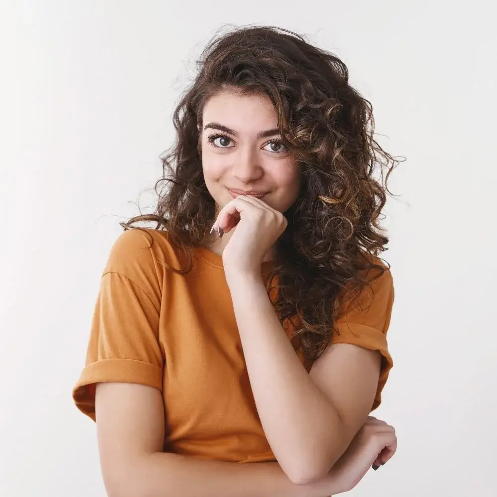 How does humidity affect the effectiveness of a hair straightening spray?