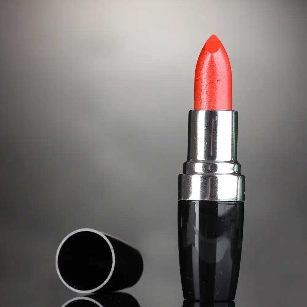 red lipstick in a black tube