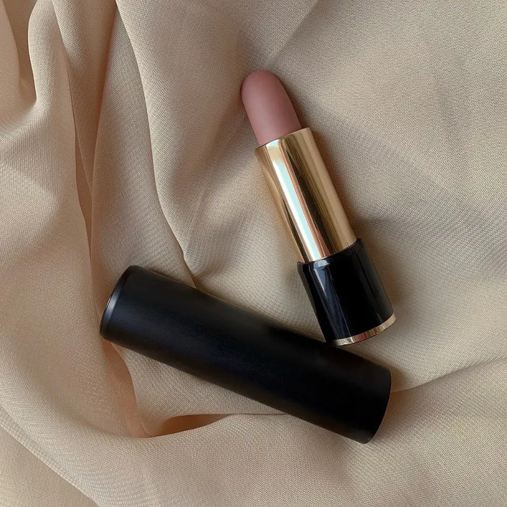 nude lipstick on a beige fabric
