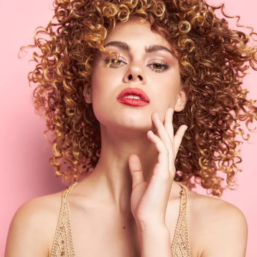 beautiful curly woman with make up and lipstick