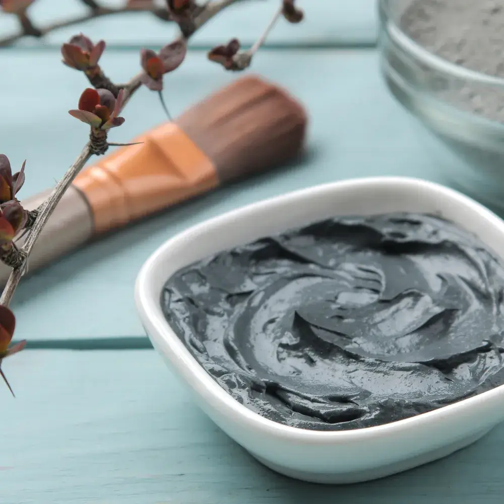 clay mud mask in a porcelain bowl