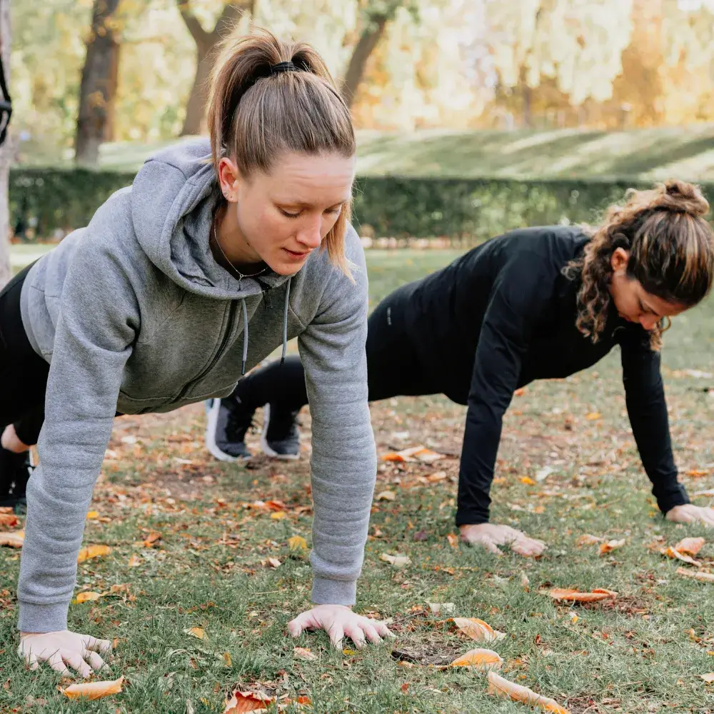 two women exercising together