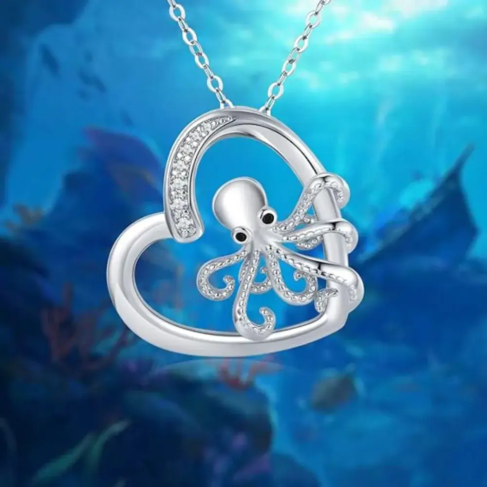 silver octo necklace with a heart