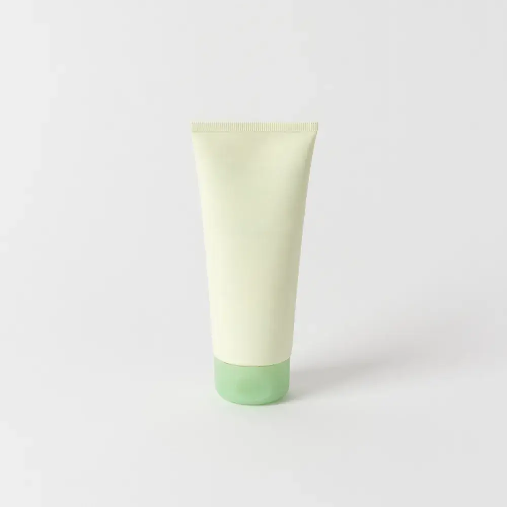 hand cream in a tube against a white background