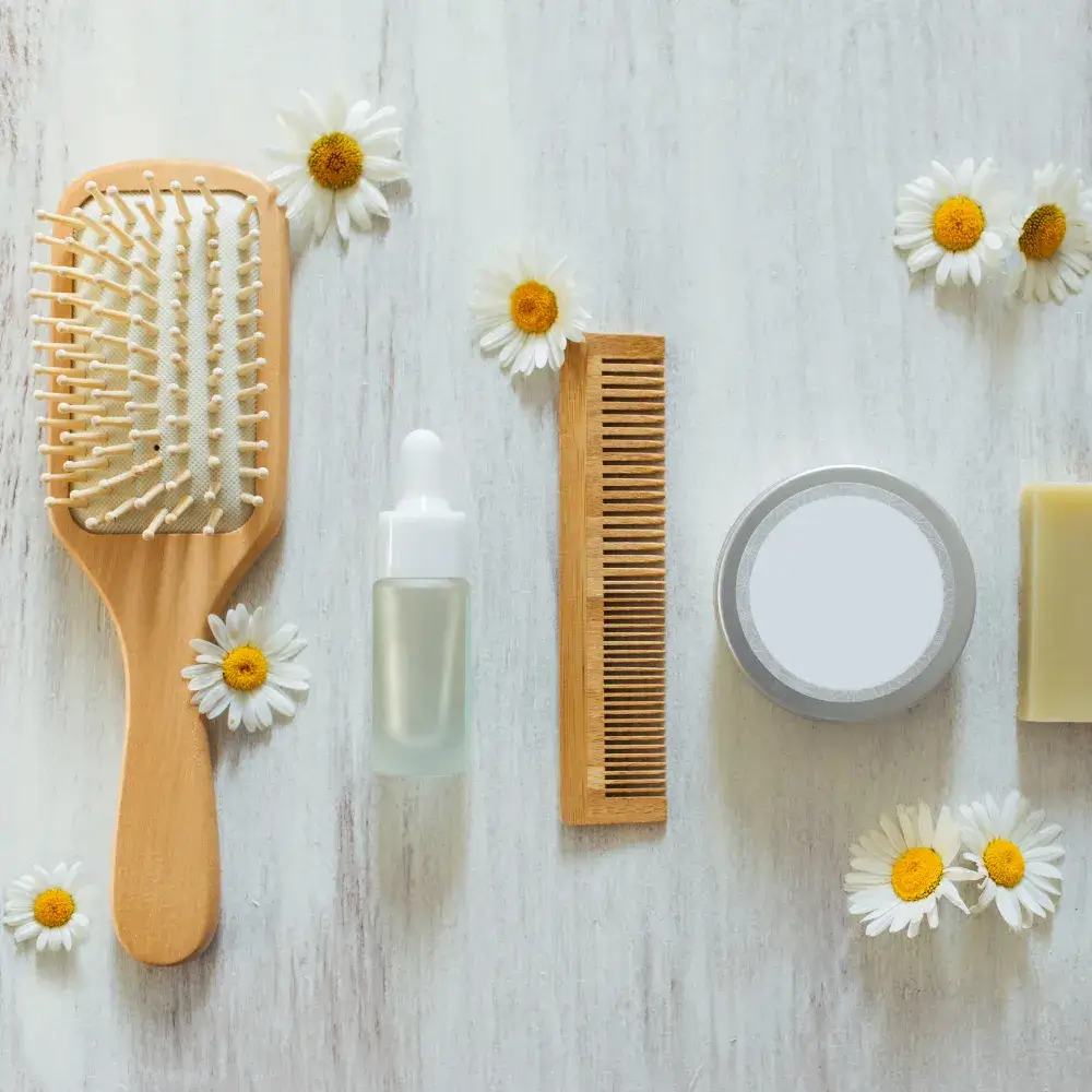 wooden hair brush and comb and other hair products 
