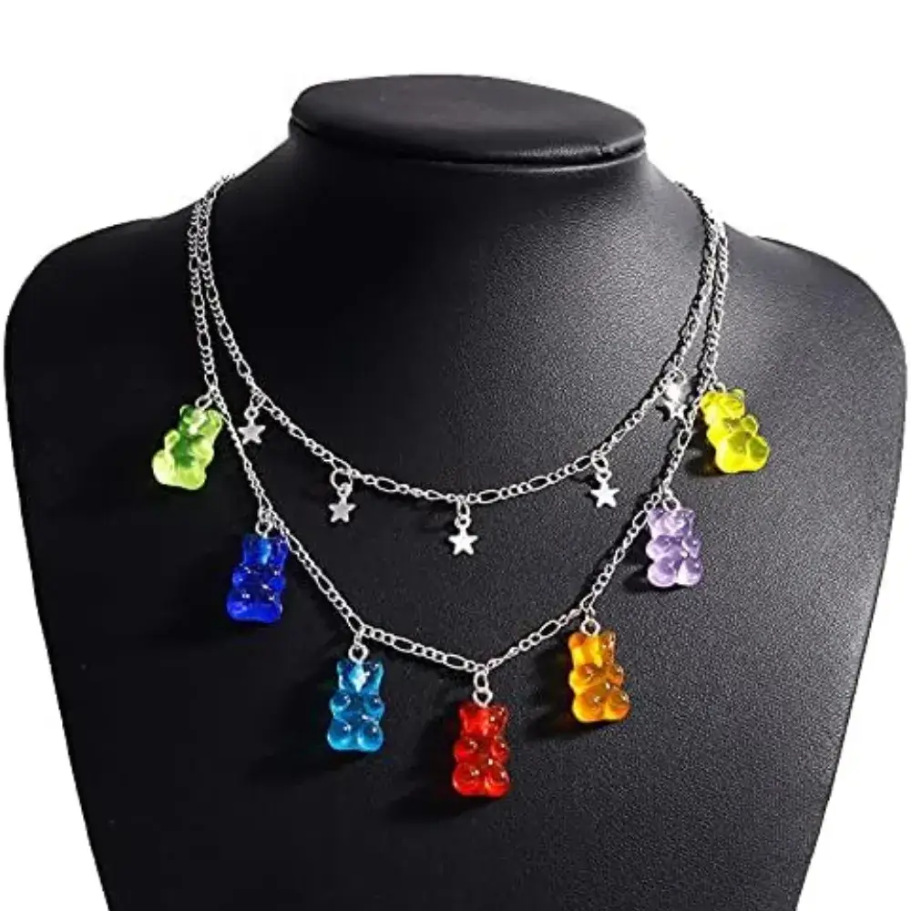 black mannequin with gummy bear necklaces