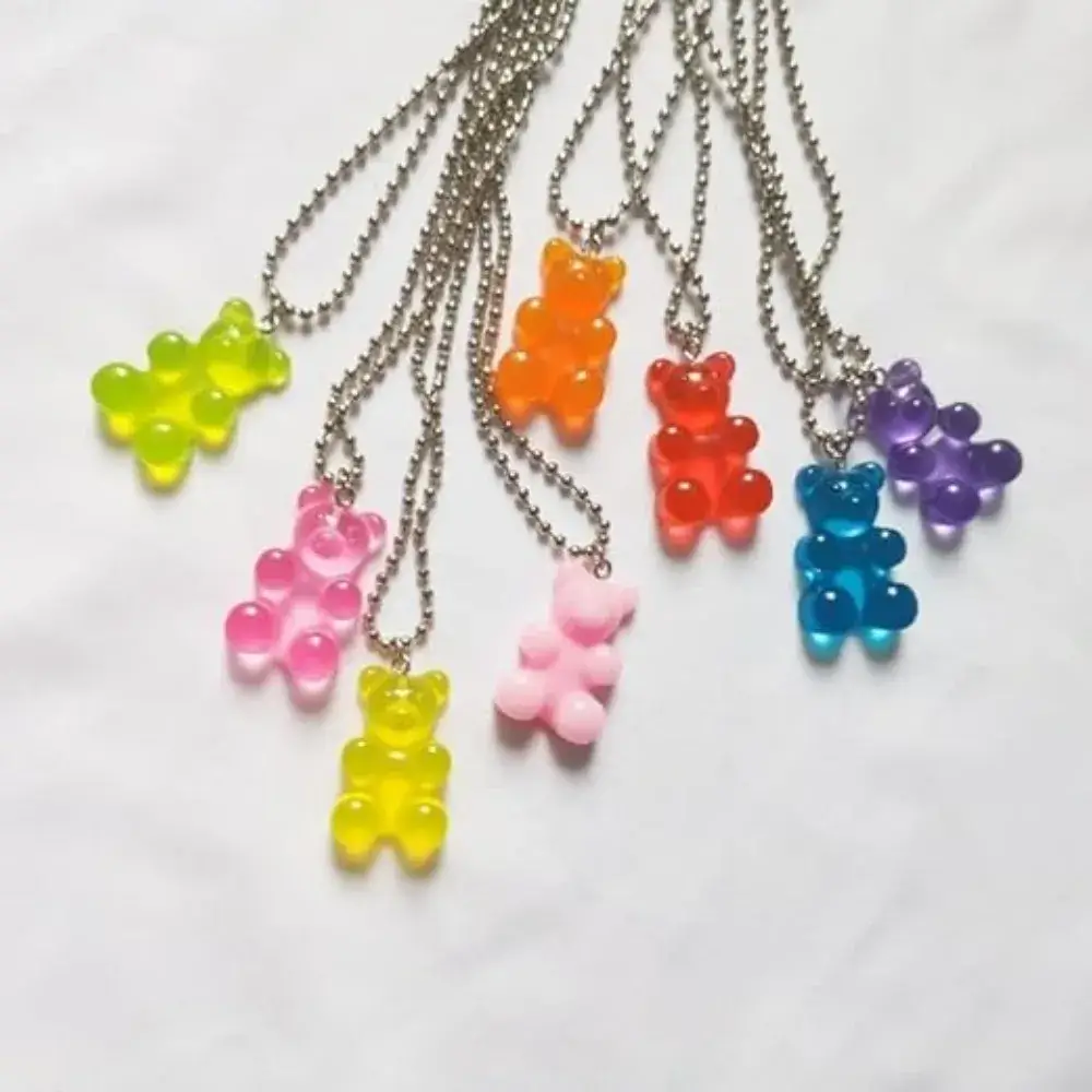 silver necklaces with colorful gummy bear pendants