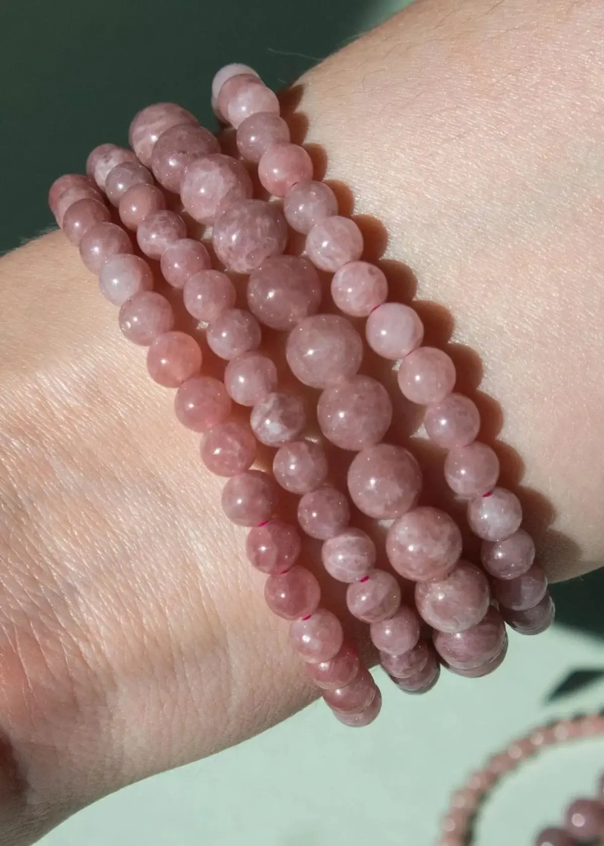 How do I Clean and maintain my Strawberry Quartz Bracelet?