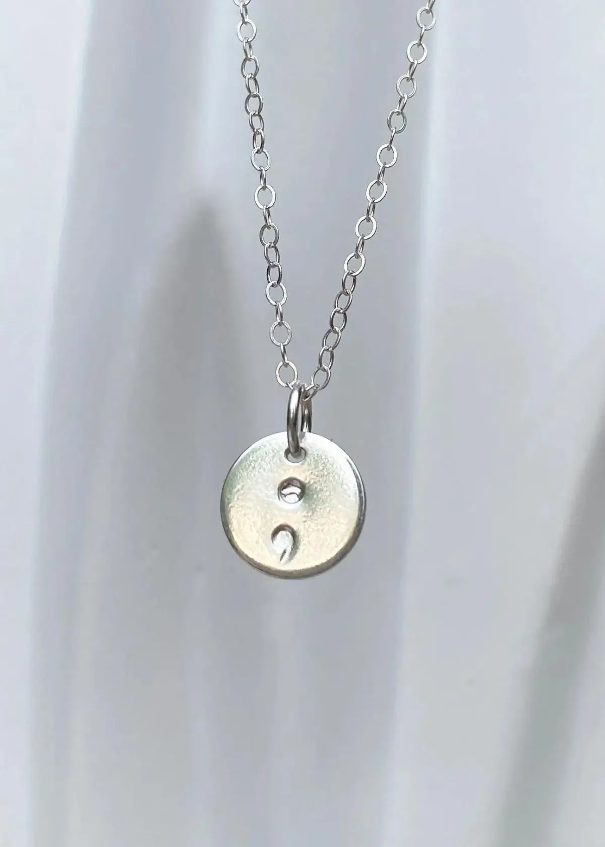 What does Semicolon Mean in Necklace?