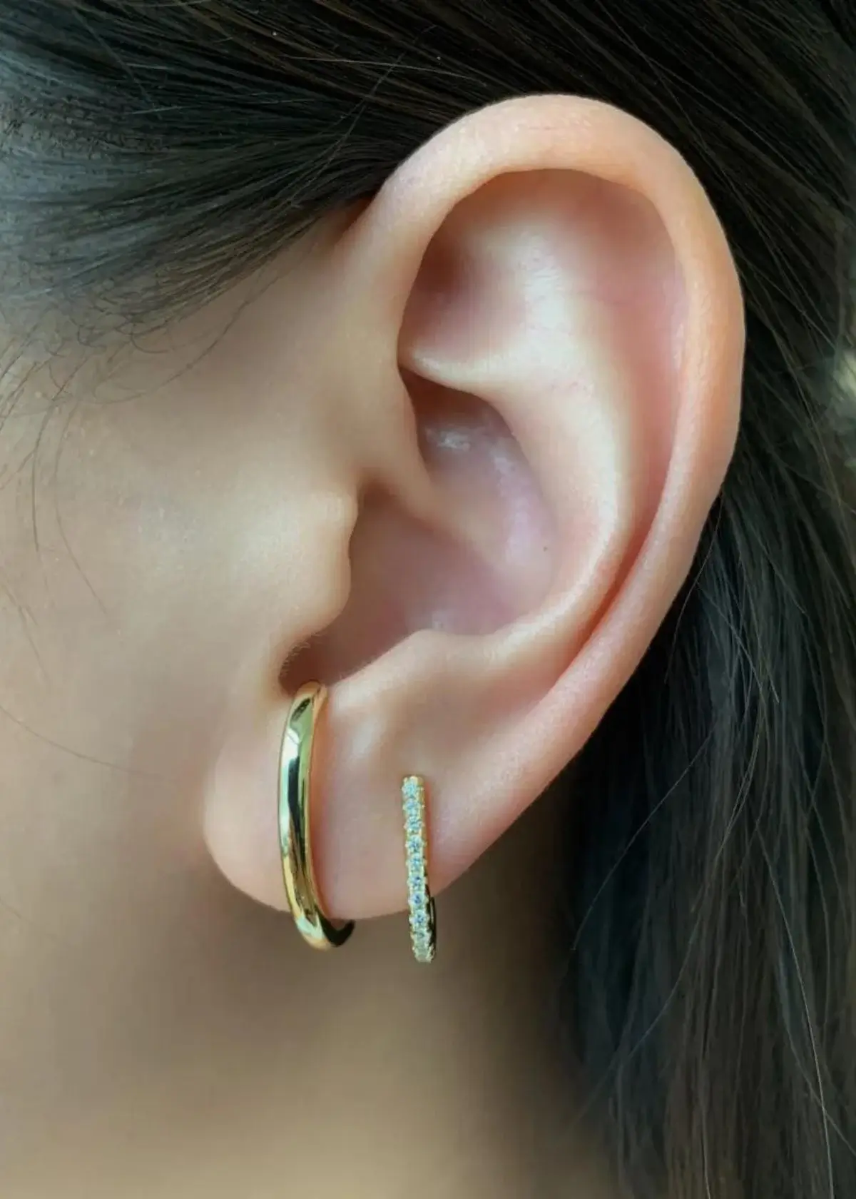 What materials are used to make Suspender Earrings?