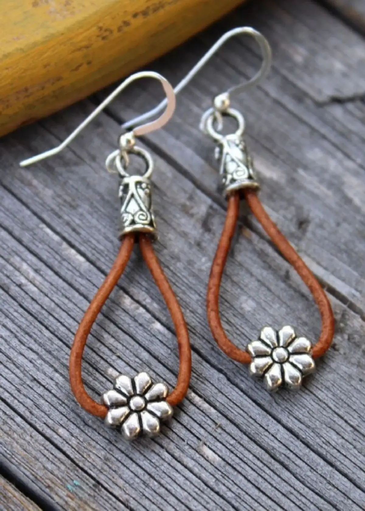What types of ear findings are used for Cowgirl Earrings?