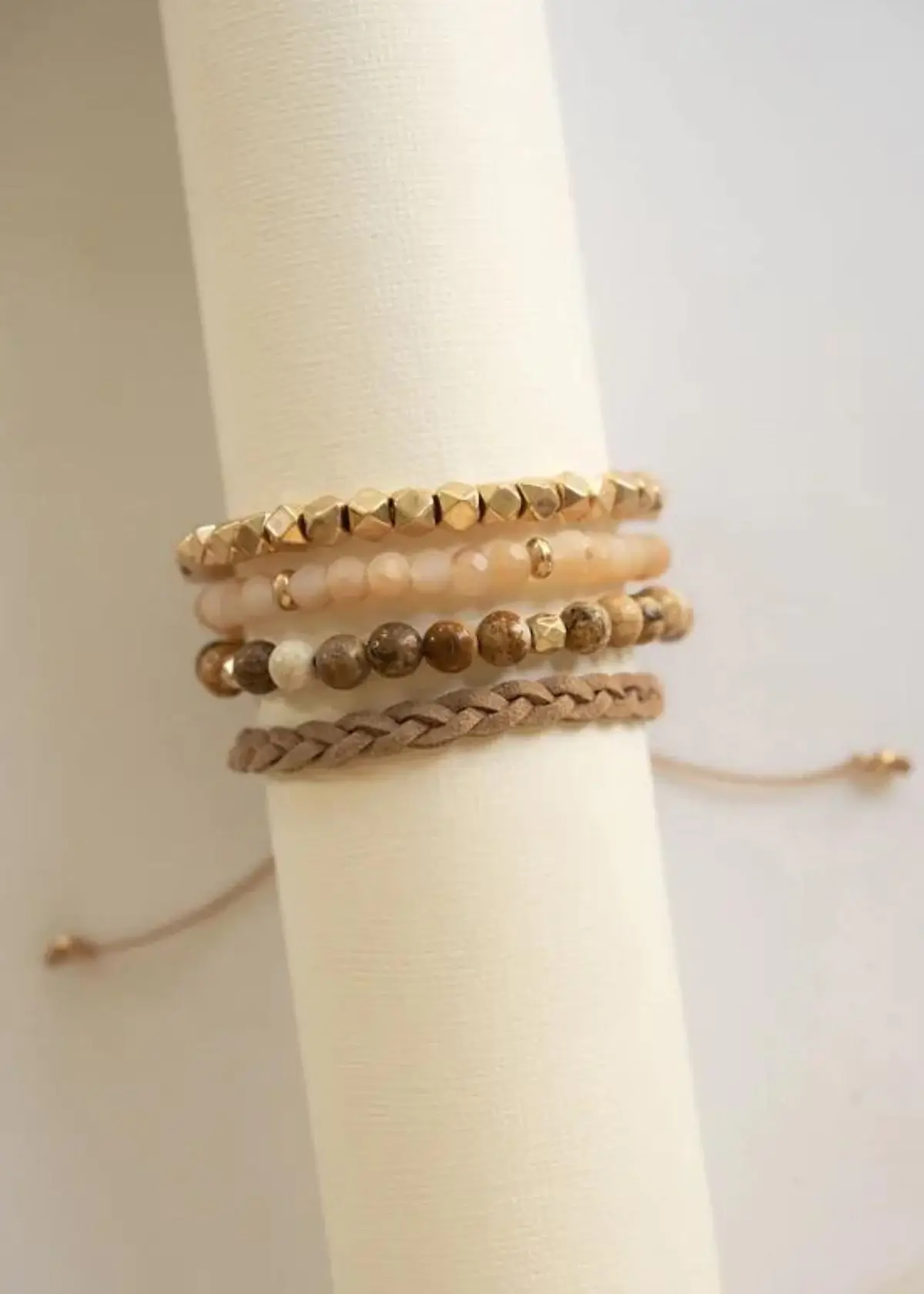 How many bracelets should I wear for a well-balanced layered look?
