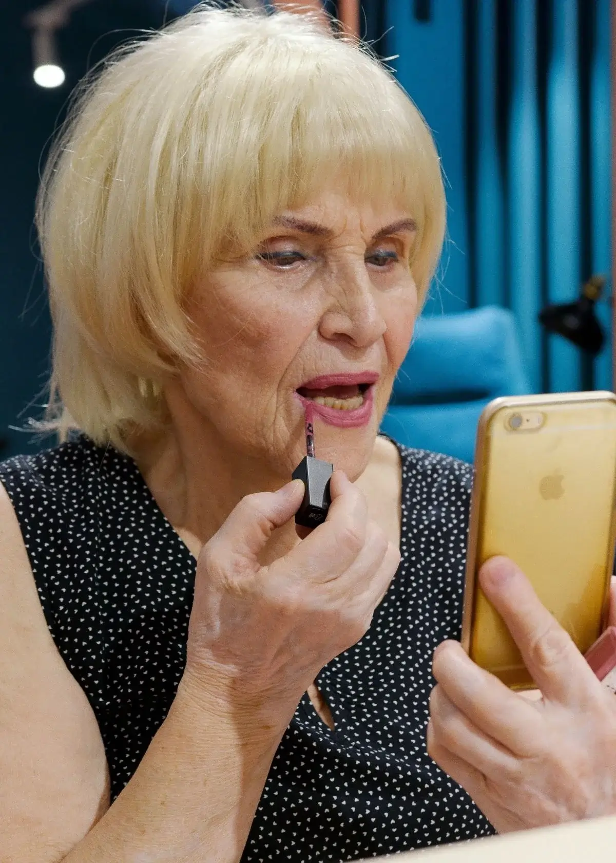 What factors should older women consider when choosing a lipstick shade to complement their mature skin tone and features?
