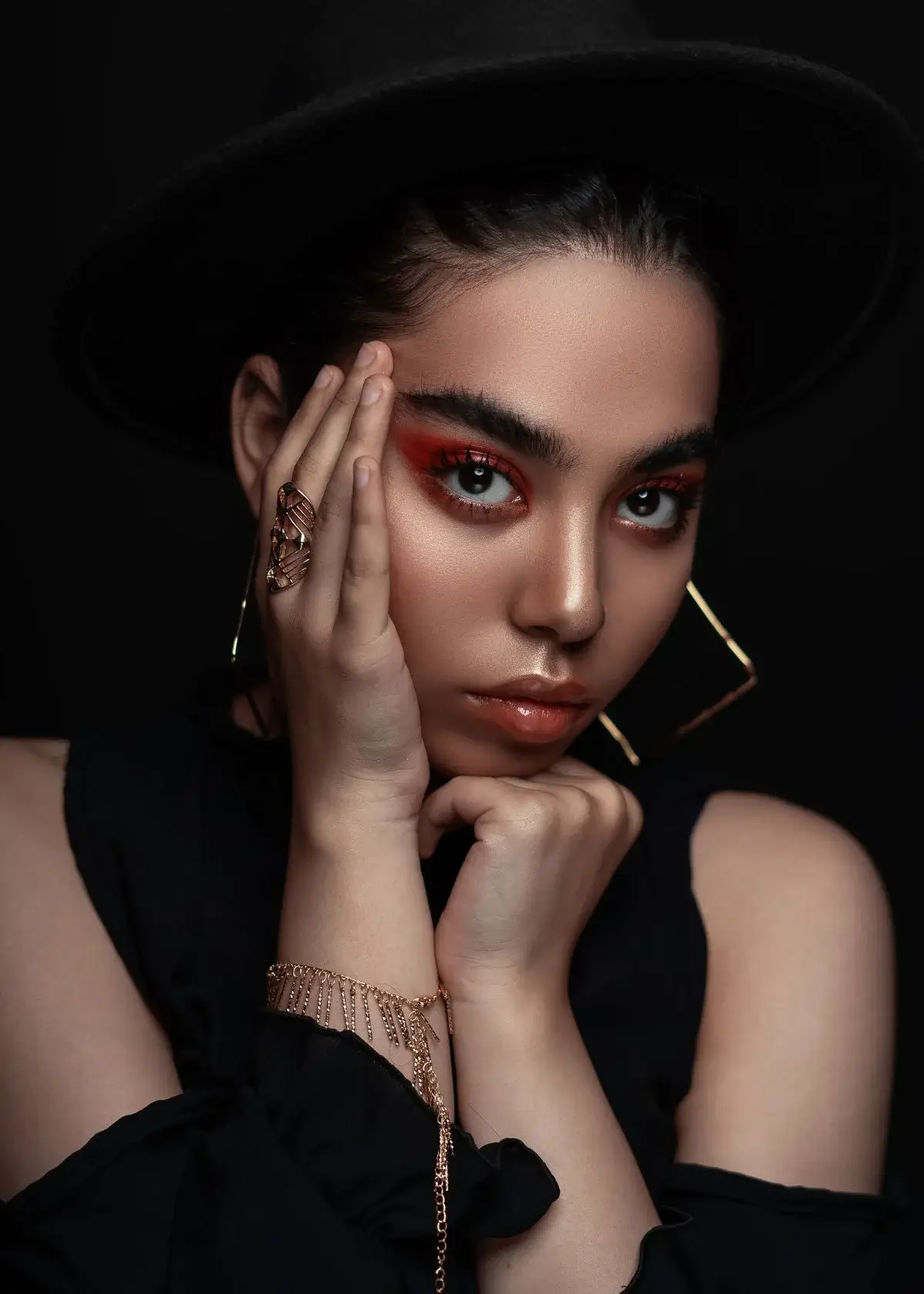 What tools should I use to apply cream contour products from a palette?