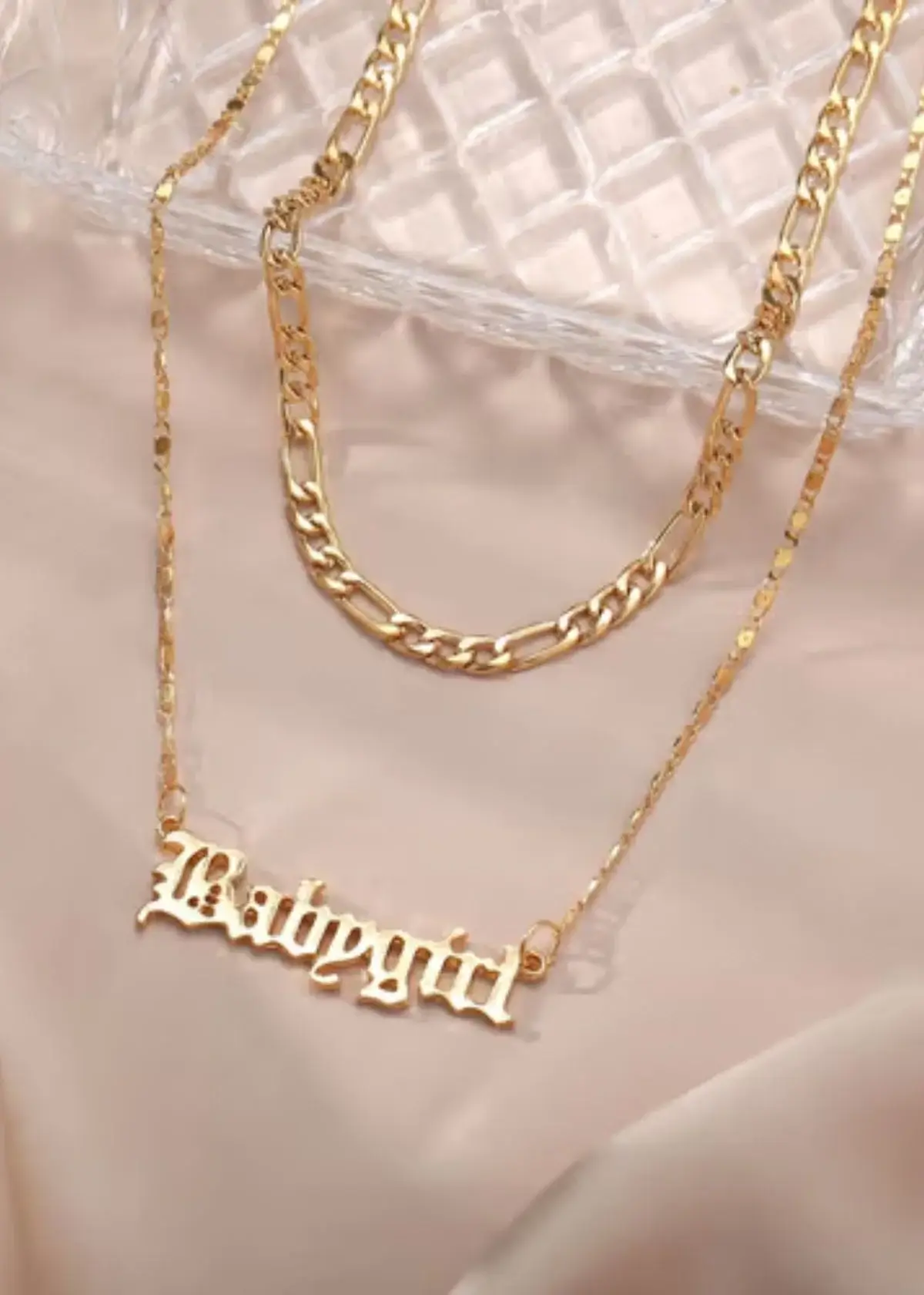 How do I care for and clean my babygirl necklace?
