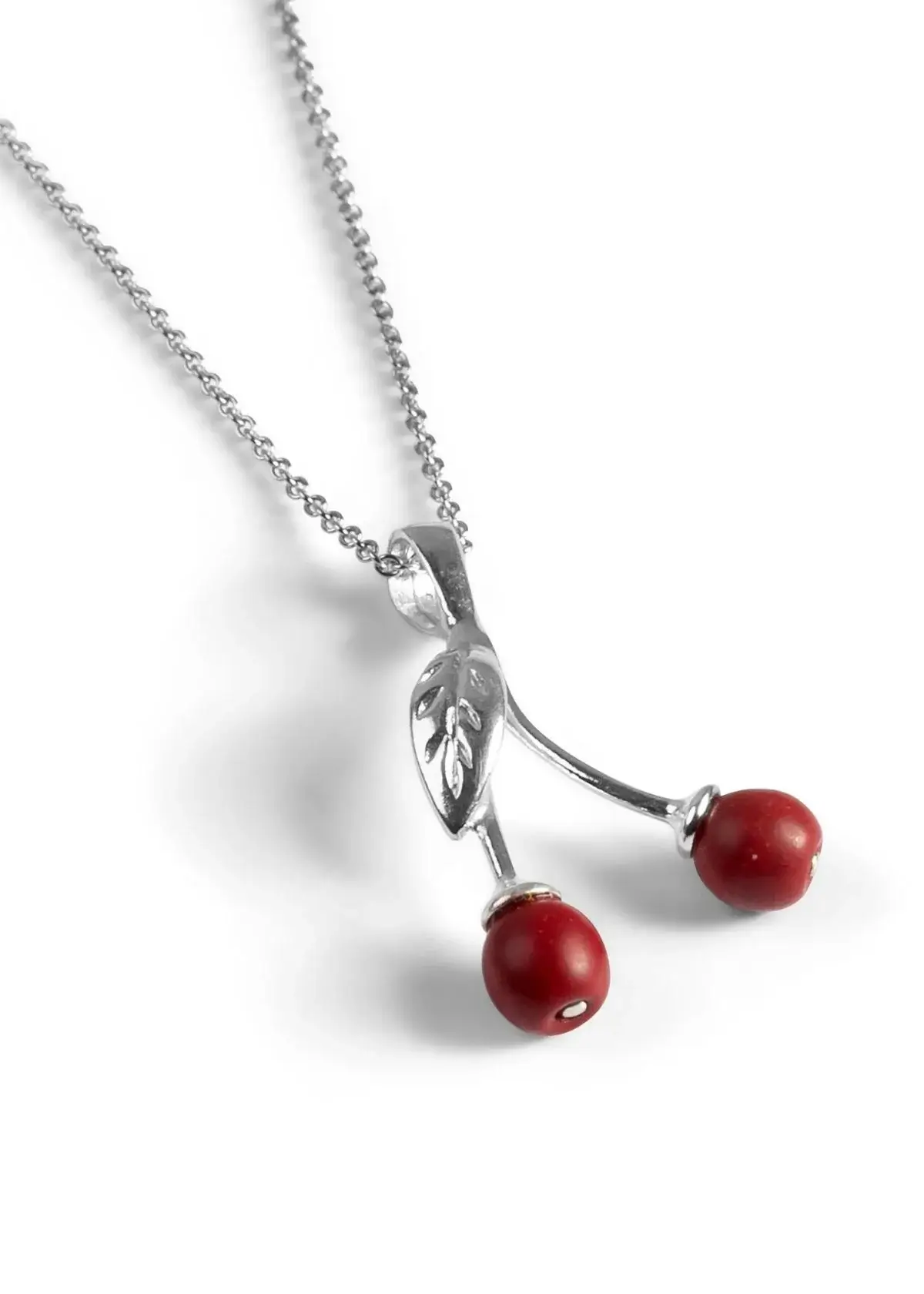 What does a cherry symbolize in a necklace?