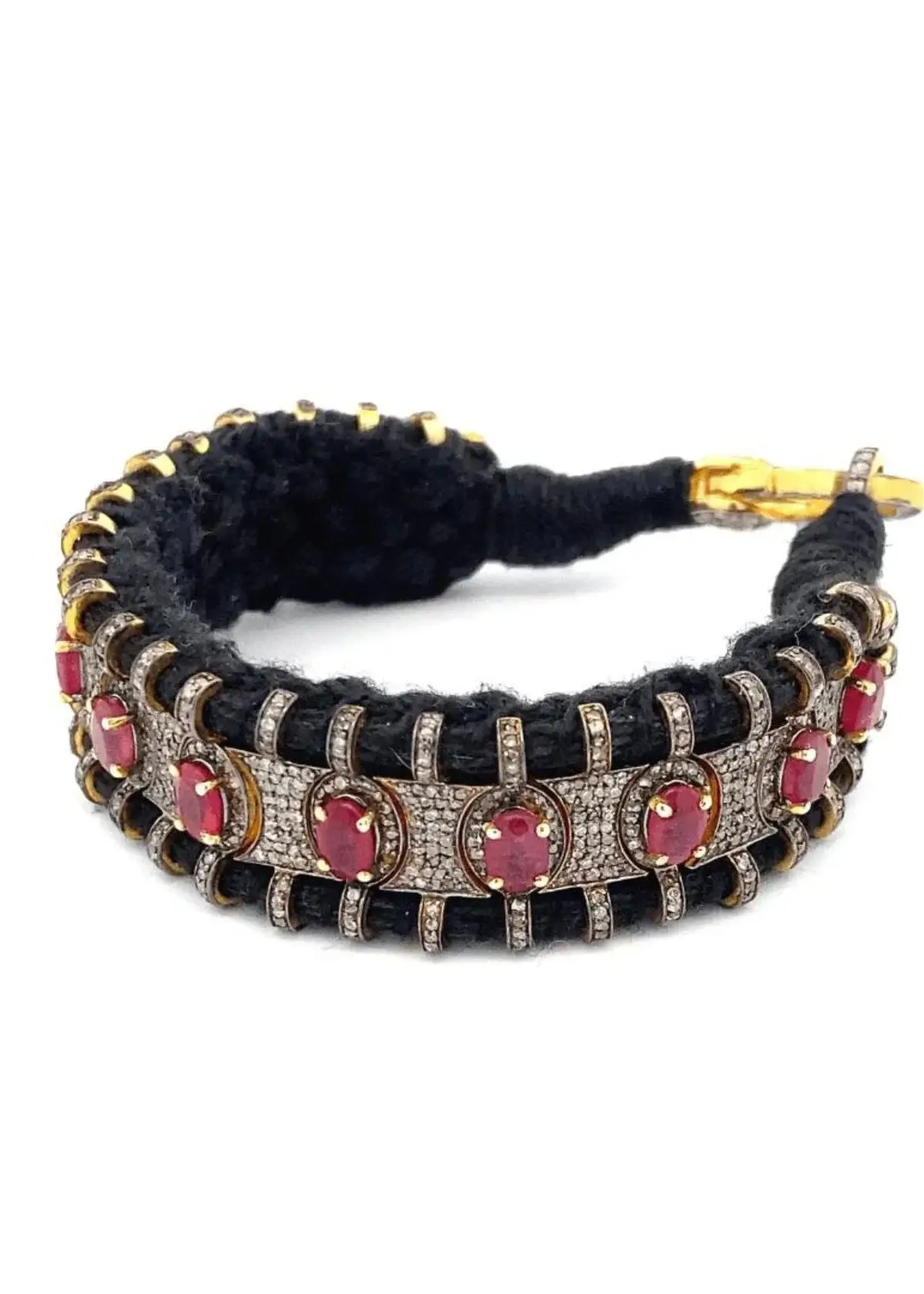 What does a ruby bracelet symbolize in men's jewelry?