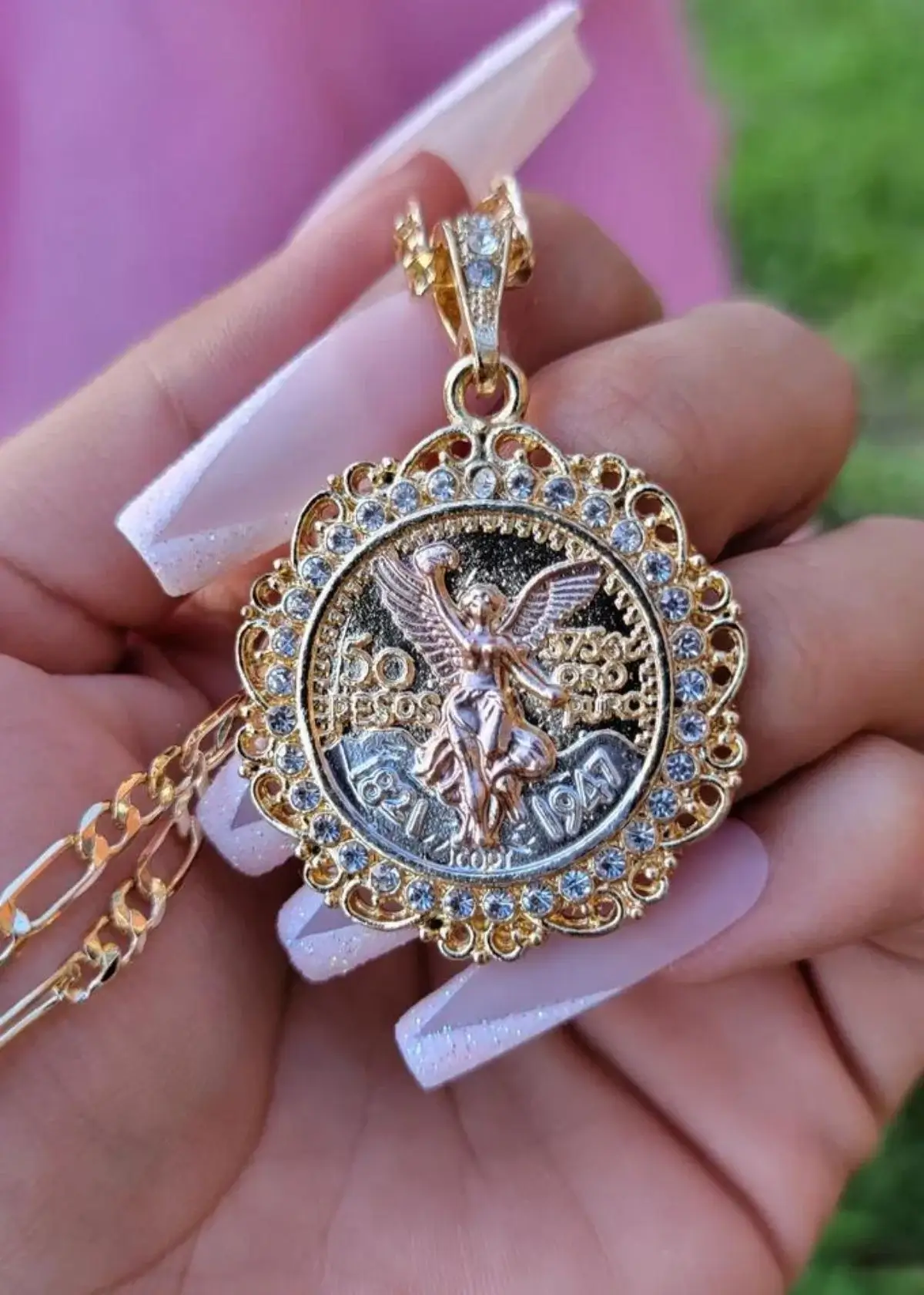 What does the Centenario on the necklace represent?