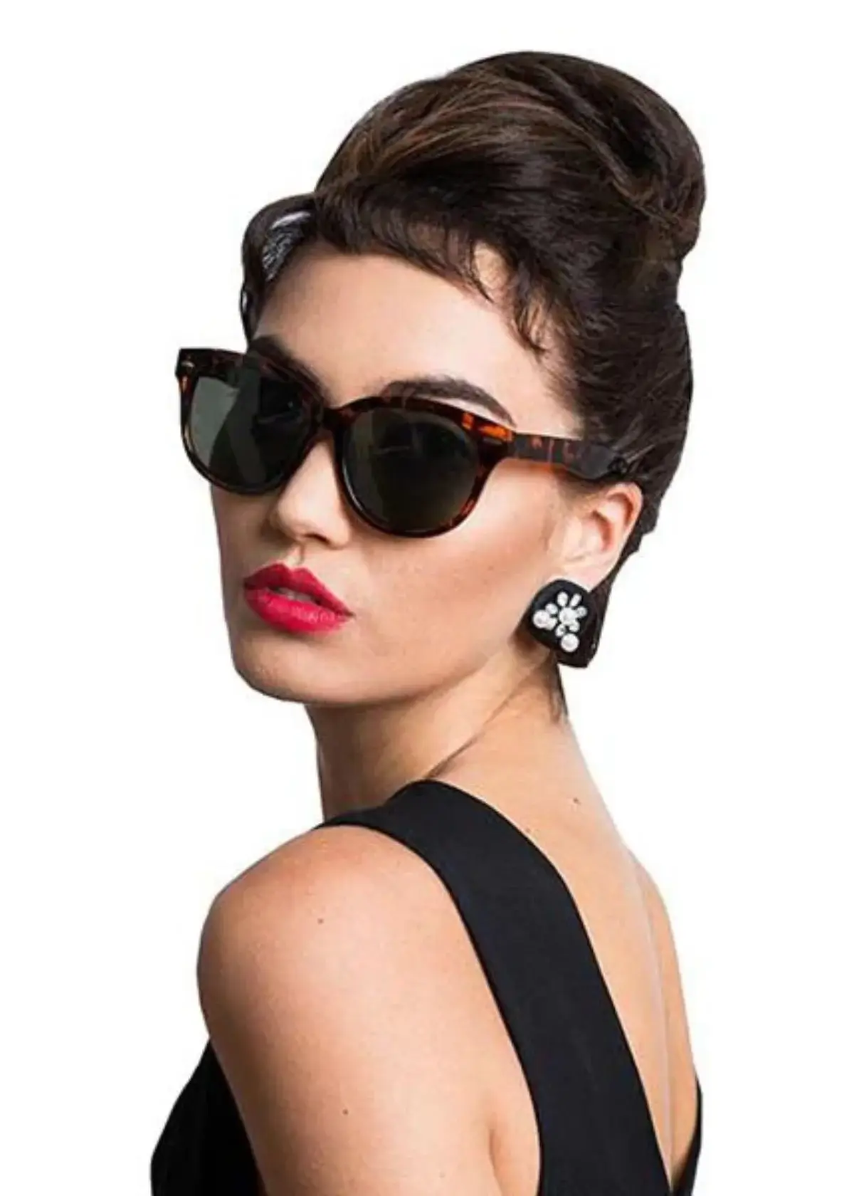 What other accessories did Audrey Hepburn often pair with her sunglasses?