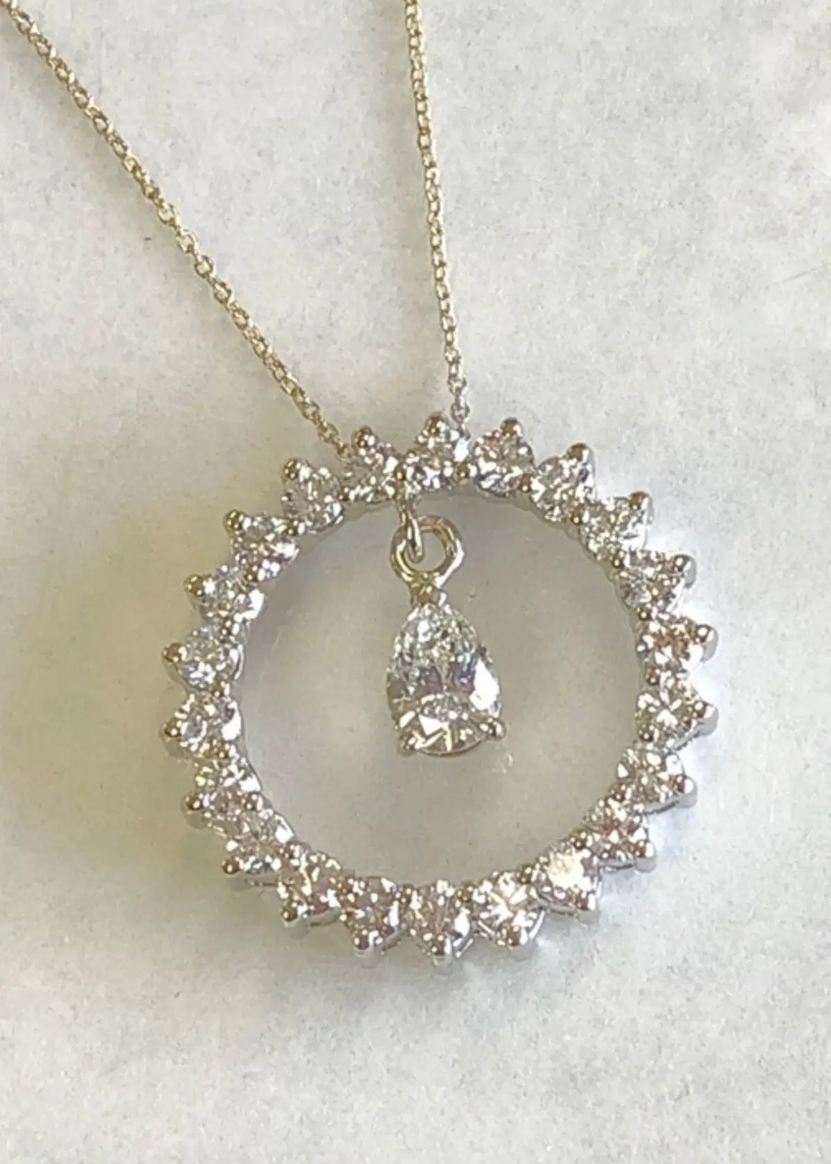 How do I choose the right diamond quality for an eternity necklace?