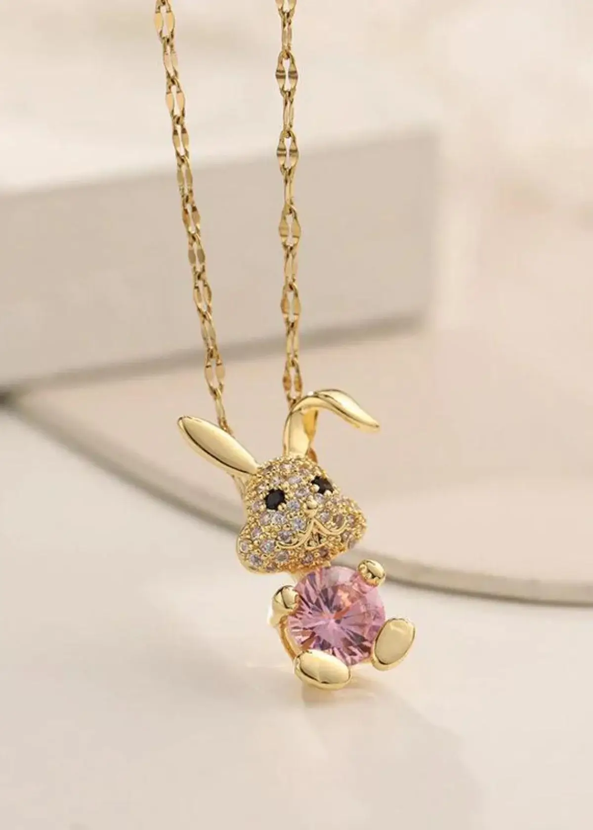 How do you clean a bunny necklace?